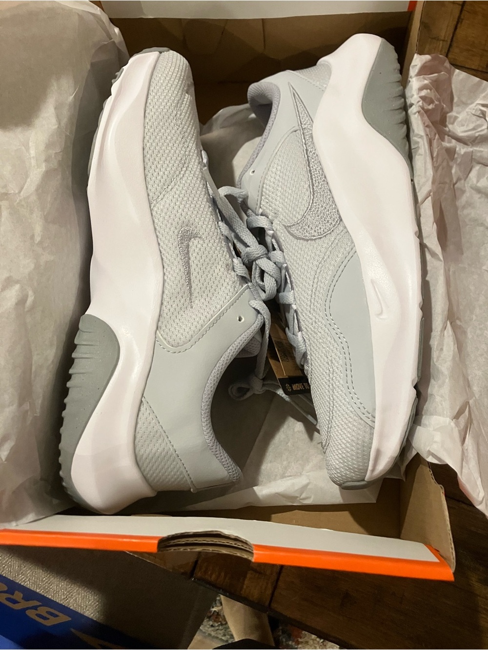 women’s Nike Legend Sz 9- grey/white